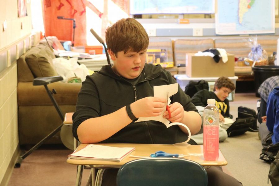 Junior Nate McLean works on his project in Spanish class this week. McLean has been in Spanish since freshman year.