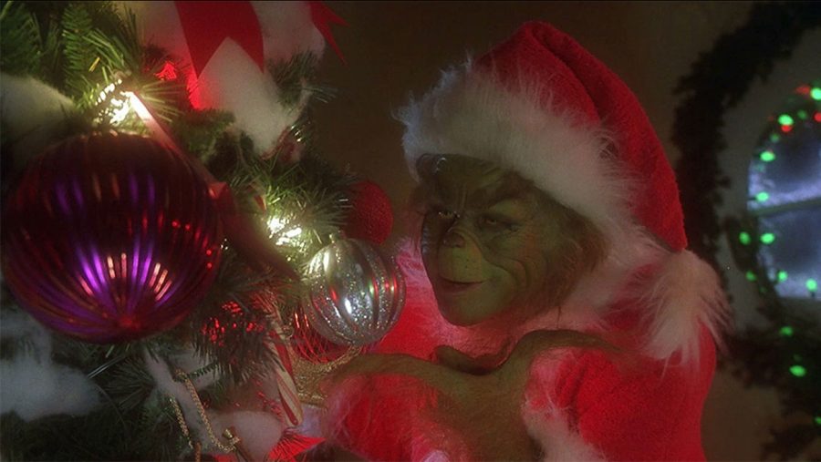 The Grinch stealing Christmas from the little ones in Whoville.