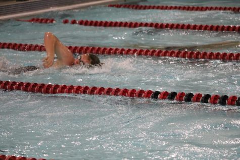 Trojan Swimming Places Fourth
