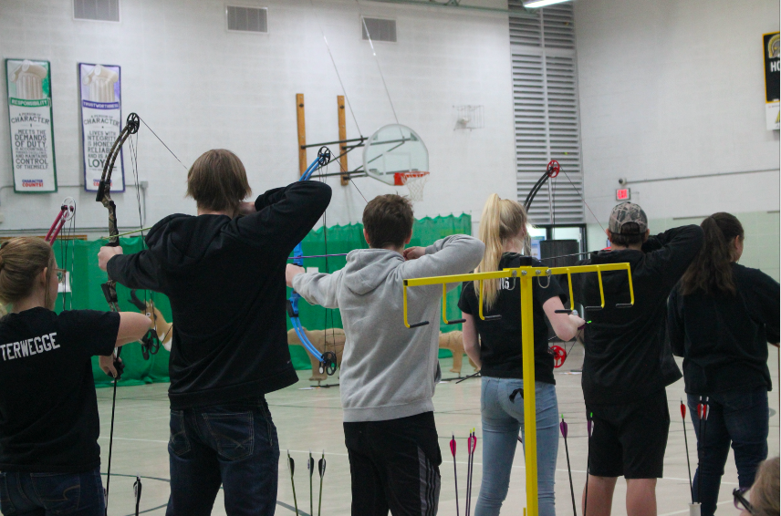 Archers+prepare+to+shoot+their+arrows.+The+archery+team+is+comprised+of+middle+and+high+schoolers.+