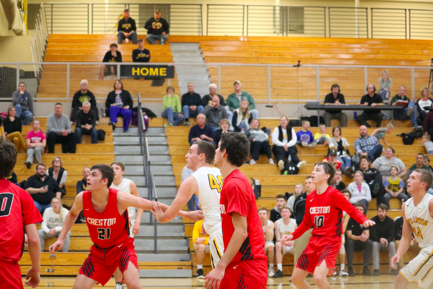 Both teams have their eyes on the ball, hoping to cop a rebound. Creston has topped Atlantic two times this season.