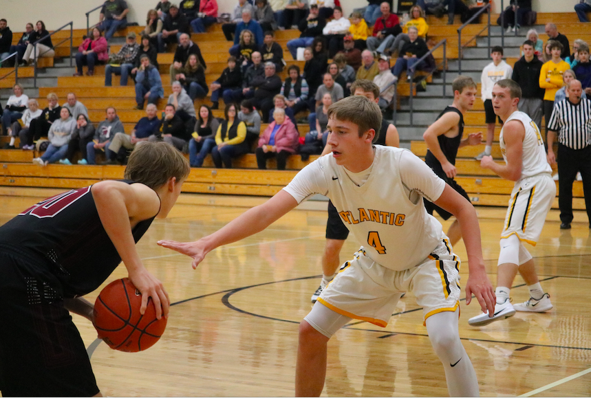 Junior Skyler Handlos plays defense on the home court. He had seven rebounds against the Knights. 