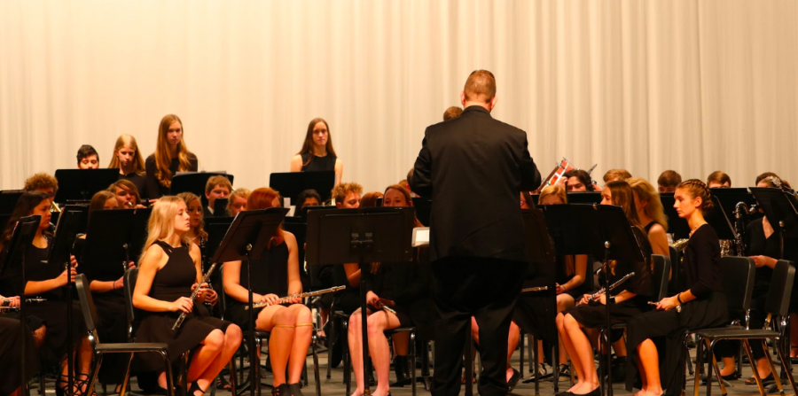 The+AHS+band+performs+at+their+winter+concert.+Before+the+band+played+their+last+song%2C+the+five+musicians+accepted+into+SWIBA+were+honored.+