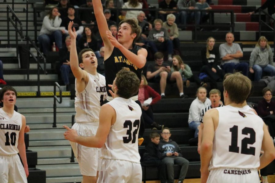 Junior Skyler Handlos goes in for a layup. He leads the team in scoring, averaging 16.9 points per game.