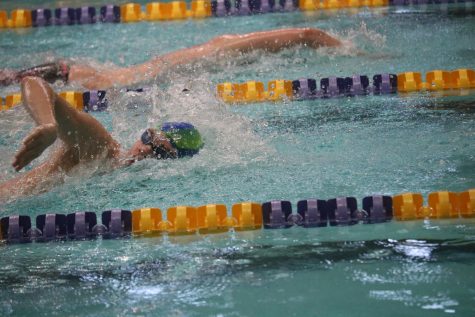 Swim Team Competes at State-Qualifying Meet
