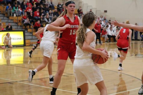 Senior Kenzie Waters looks for an open girl. She leads her team in assists with 52.