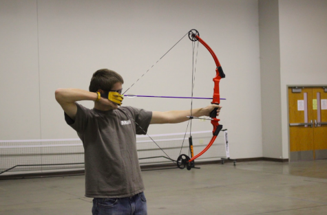 Senior Dustin Dreager prepares his shot. Dreager has been involved with archery all four years of high school.