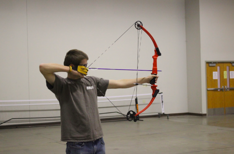 Senior+Dustin+Dreager+prepares+his+shot.+Dreager+has+been+involved+with+archery+all+four+years+of+high+school.