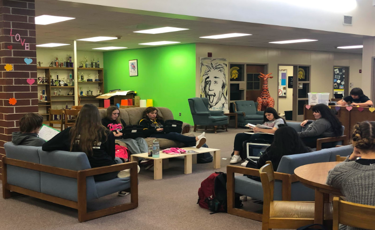 Students in the library study during their free period. The couches are open to anybody during this time. They are used for comfort and socializing, the interactions helping improve the student culture.