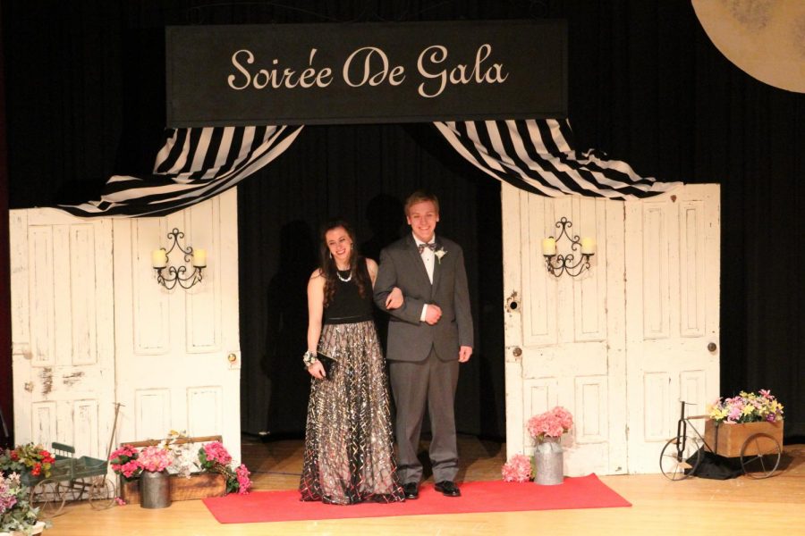 Senior Erin Barrick and Joel Behrens pose at Grand March last year. The theme for Prom 2019 was A Night in Europe.