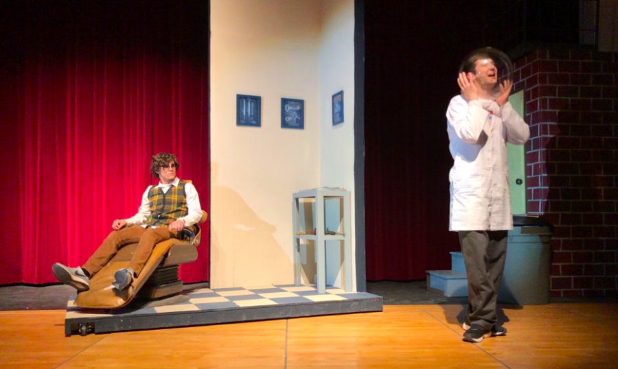 Seymour Krelborn--portrayed by senior Bradley Dennis--looks in shock at the dentist--played by senior Clayton Jipsen. This is both boys fourth musical production at the high school.