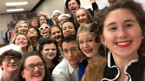 Cast members pose for a selfie before the 2019 musical