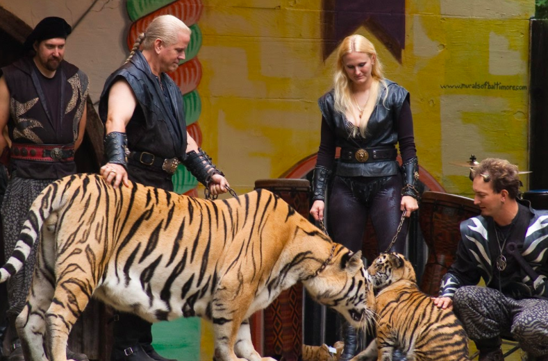 Doc Antle showcases one of his tigers for a crowd. Antle plays a large role in the series, as he runs a zoo in Myrtle Beach, S.C. At the beginning of the series, Antle and fellow zoo owner Joe Exotic have a friendly working relationship.