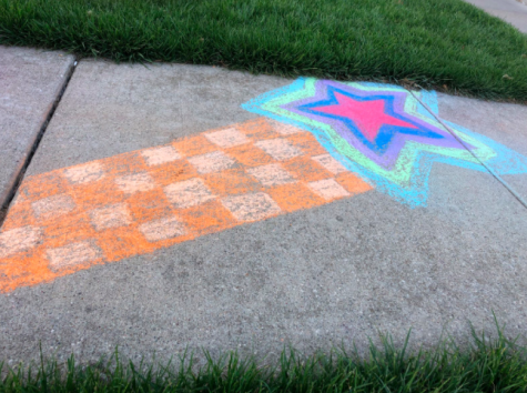 Senior Kylie Neal decorated her driveway and sidewalk with chalk. Neal noticed other posts on Facebook showcasing sidewalk art.