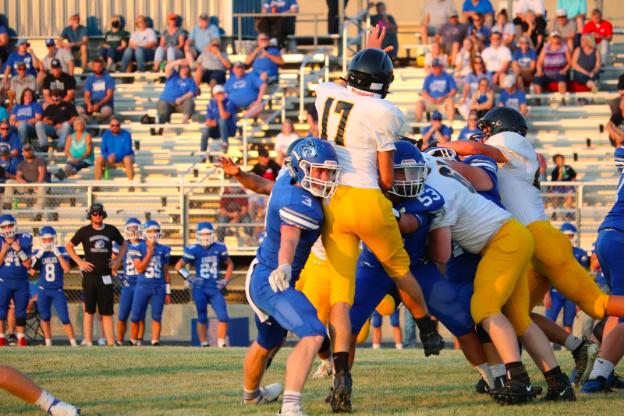 Colten Tasto catches some air at Friday nights game. The Trojans kicked off the season in Underwood. 