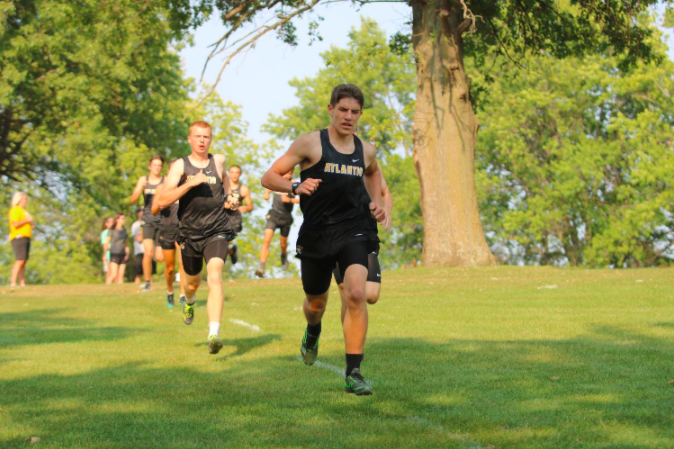 Senior Ethan Williams races to the finish line. Williams is one of seven varsity runners on the boys team.
