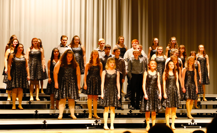 The 2019 freshman show choir performs on stage. The days of performing in close groups have been put on hold due to the pandemic. 