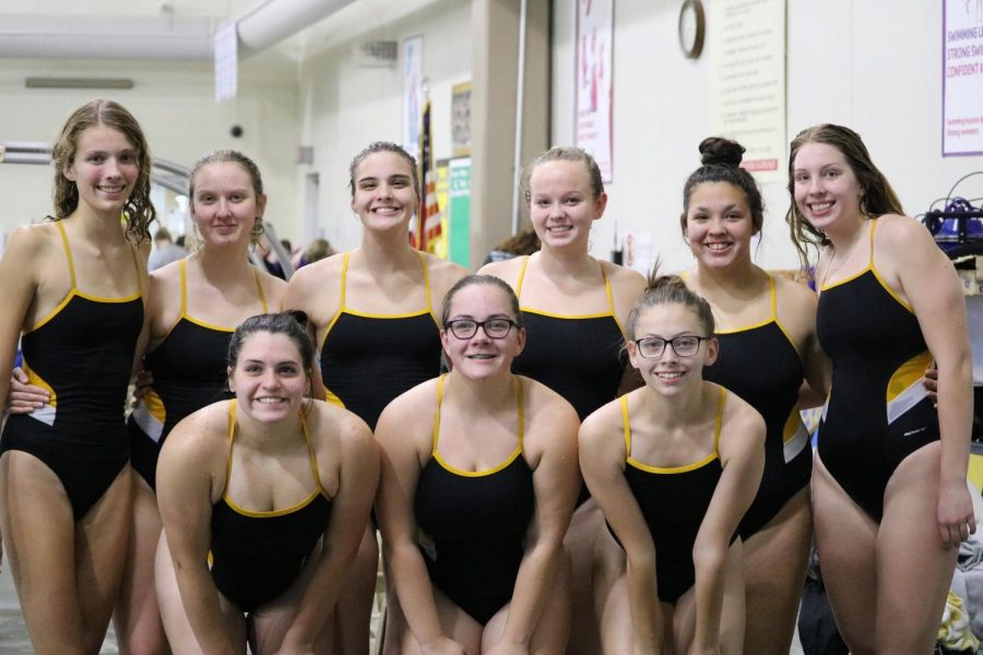 The Atlantic girls swim team traveled to Spencer Oct. 13. Eight of the girls swam at the triangular against Spencer and Perry. 