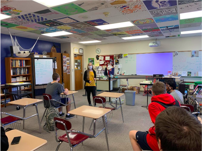 Senior Ariel Clark talks to Allison Berryhills class. Clark is a TA this year. Eligible students can be a teachers assistant for any class that a teacher approves. 