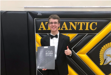Lex Somers celebrates acceptance into the all-state band during his sophomore year. All four years of high school, Somers auditioned and earned a spot in the band. 