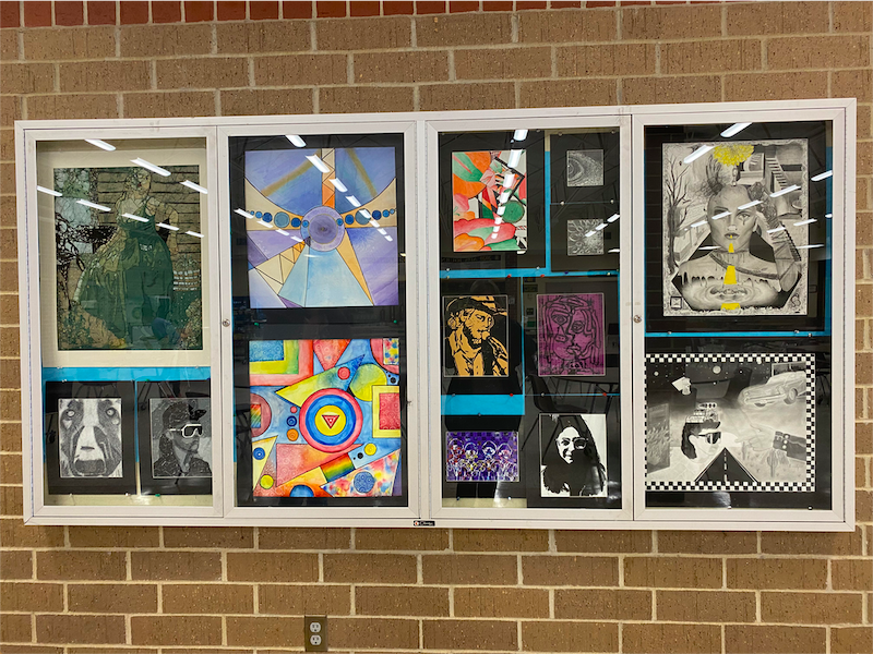 Students art work is shown in a display case located in the commons. There are currently 40 students involved in different levels of art class. 