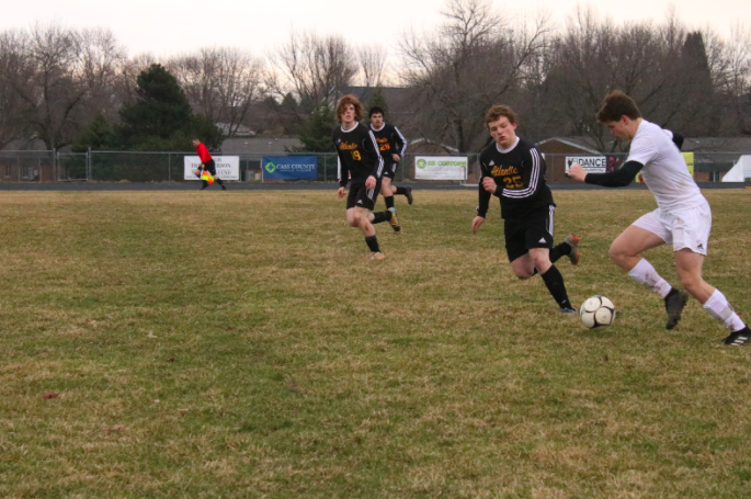 Senior Devin McKay chases after the ball during a game in 2019. McKay will be competing for his fourth year during this upcoming season.