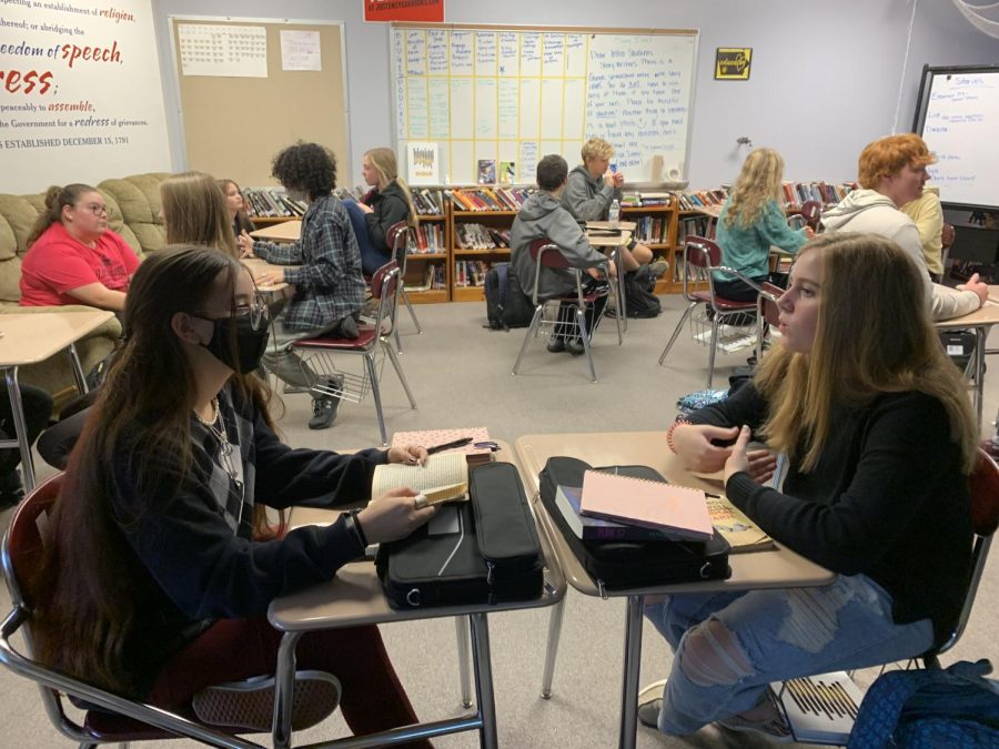 Students in the class of 2025 discuss the novel Animal Farm during English class. Academics are only a fraction of the high school experience. 