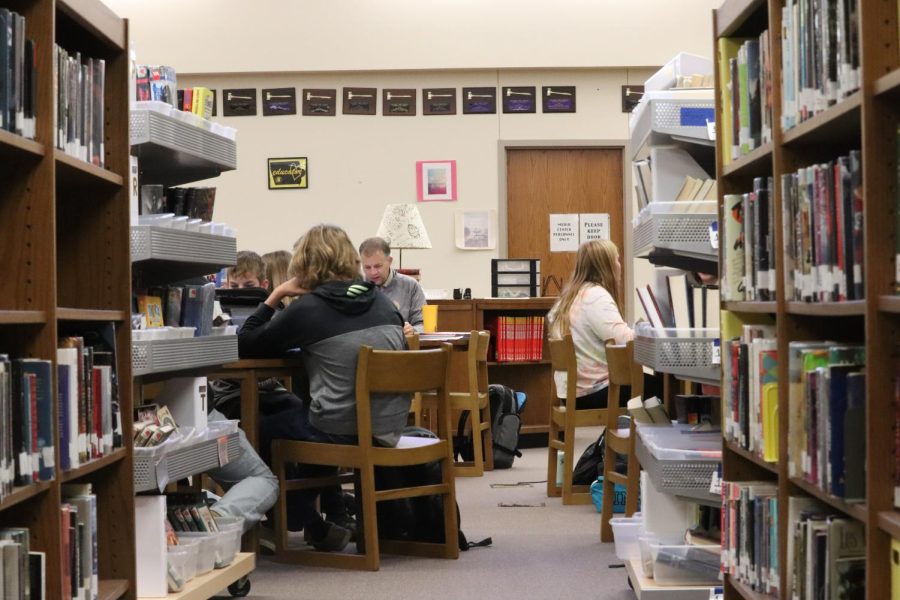 A change of scenery has been noticed in the library of AHS. Instead of Mr. Simpson’s English classes filling the space or high schoolers studying, temporary walls separated the library into different rooms for eighth graders. Mr. Juhl’s classes took up the center of the library, which converted the former check-out station into Juhl’s new desk.  
