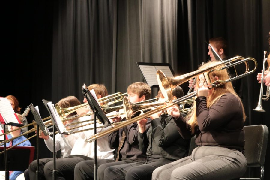 ALL ABOUT THE BRASS - The jazz band boasts five trombone players, the largest section group. Two of the players also play bass guitar, so they switch out on that instrument at times.
