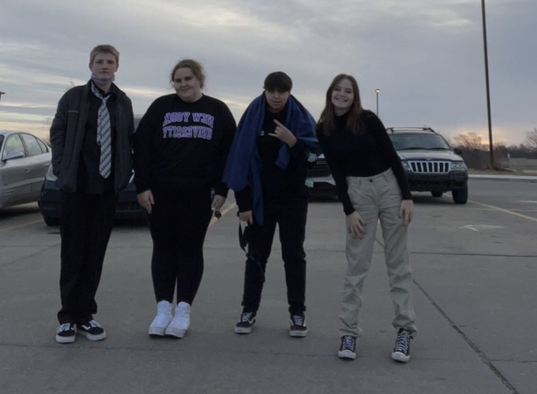 Participants from state speech enjoy the weather before performing. 