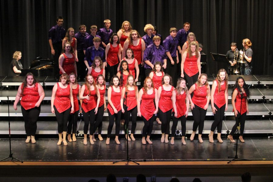 Premiere+Show+Choir+preforms+their+song%2C+Burning+Fire+Burning.+The+choir+learned+the+choreography+in+August+at+a+camp+with+Grant+Luther.