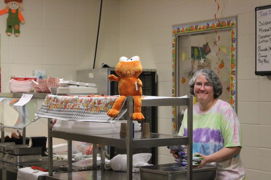 An orange frod hangs in the  cafeteria. Many of the cafeteria staff attended the Happiness Training in August.
