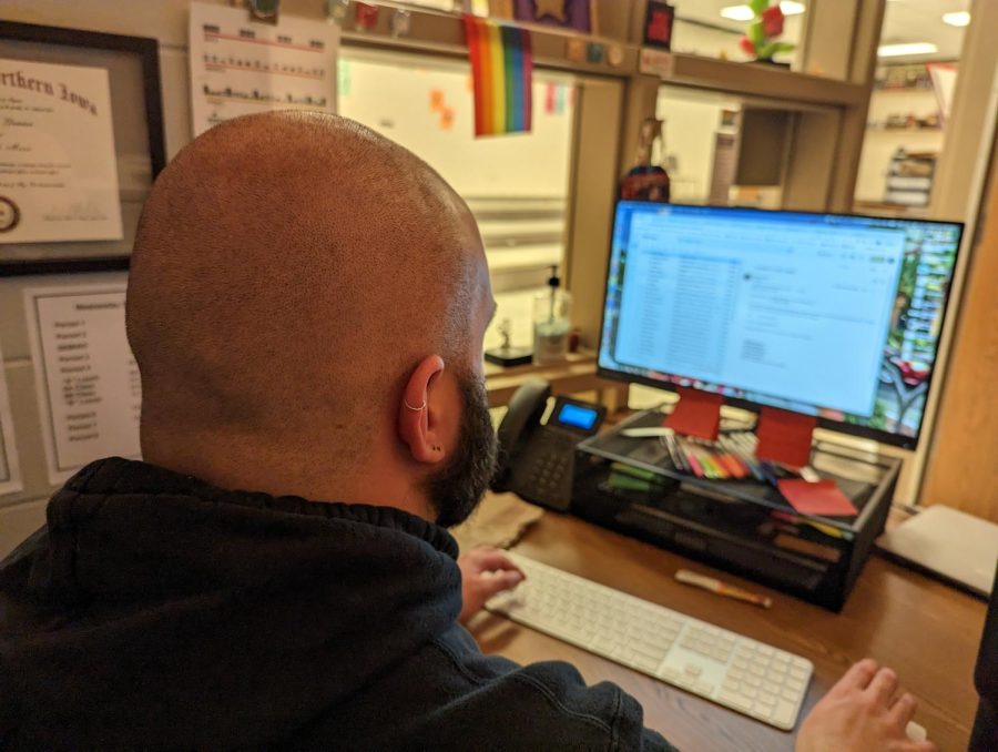 Evan Adamon looks at his computer screen.