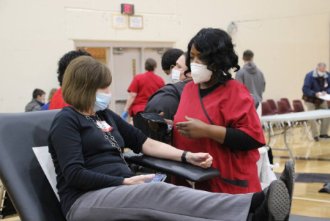 Last year, AHS held two blood drives. With the help of the National Society, they signed people up and made the blood drive run smoothly. Cathy Knuth often gives blood at the blood drives.