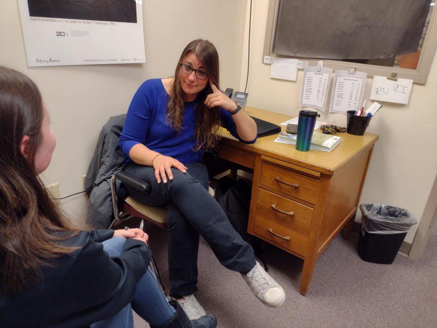 High School and Link Center Mental Health Professional Melanie Fell consoles a grieving student. Students can go to Fells AO for group counseling or contact her for a one-on-one counseling session. (Photo Illustration)