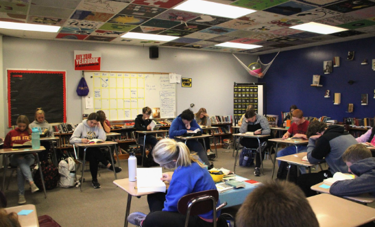 NOT A CREATURE WAS STIRRING, NOT EVEN A MOUSE–Ms. Berryhill’s fourth period freshman English Honors  class is reading it up. Every day, class begins with free reading for the first 10 minutes. So focused, still, and silent, you could hear a spider crawl.