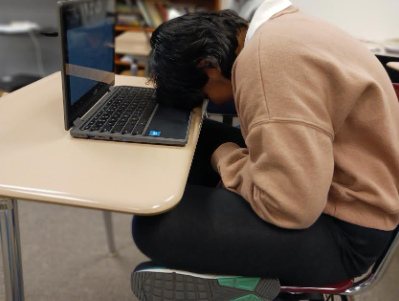 Senior Ditsha Chaudhari tries to stay focused during journalism class.
