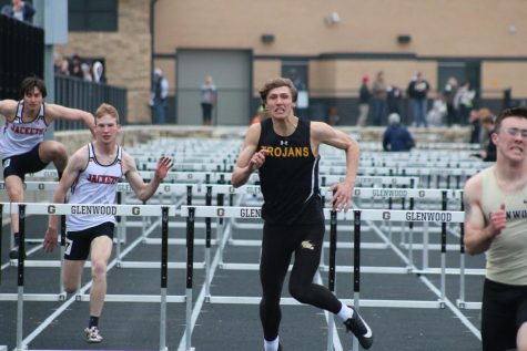 Colton Rasmussen battles through the 110m hurdles. Rasmussen qualified in the high jump, long jump, and shuttle hurdle relay.