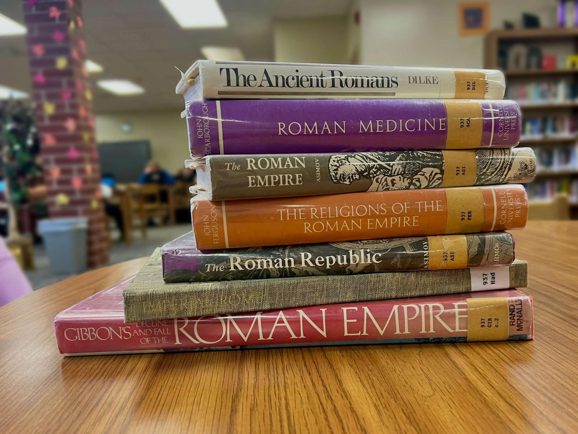 Roman Empire books are stacked in the library. The TikTok trend has been circling for many weeks now.