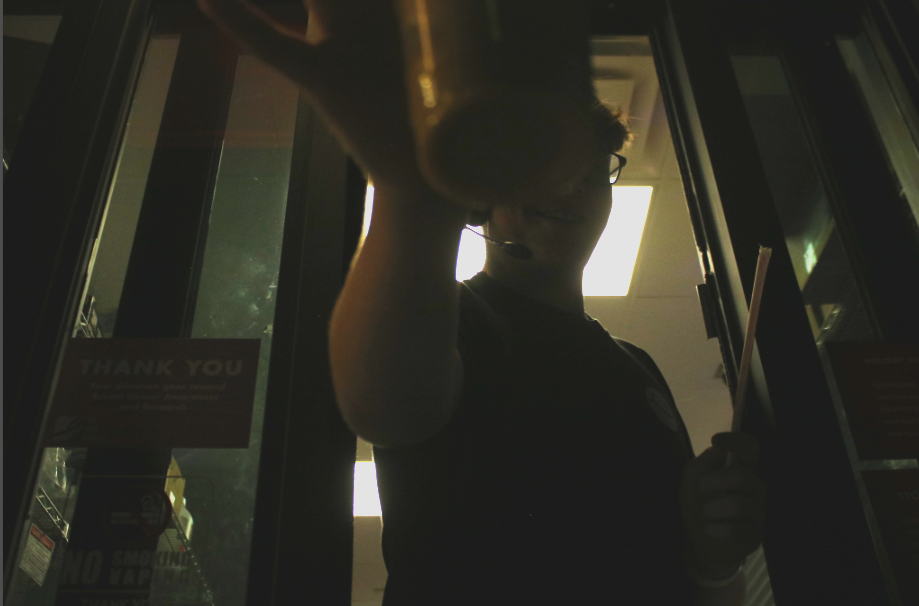 SCOOT ON UP - Freshman Rayden Wheeler hands a drink through the window at the Scooters in Atlantic. Wheeler worked with freshman Maddie Myers and Junior Drayce Moore on a busy Thursday night. Wheeler handled the window job.