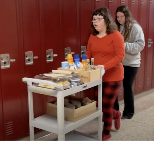 Annabel Koenig delivers coffee and pastries to teachers on Friday mornings. Koenig is building business and interpersonal communication skills.