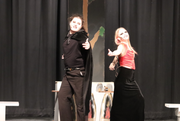 Fletcher Toft and Megan Birge dance with glee as vampire villian siblings plotting to kill human students. The play New Kids at Vampire High will be performed on Friday and Saturday nights at 7 p.m. and 2 p.m. on Sunday.