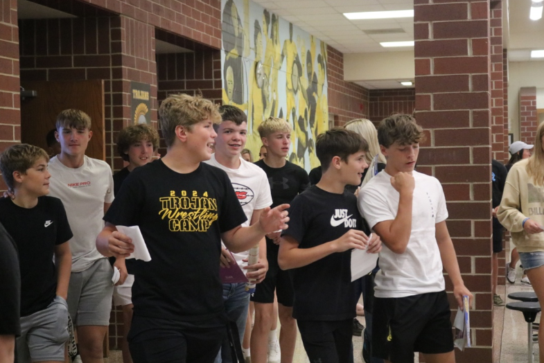 A crowd of freshmen exit the high school auditorium after freshman orientation on Back-To-School Night on August 22, 2024 -- the night before the first day of school.