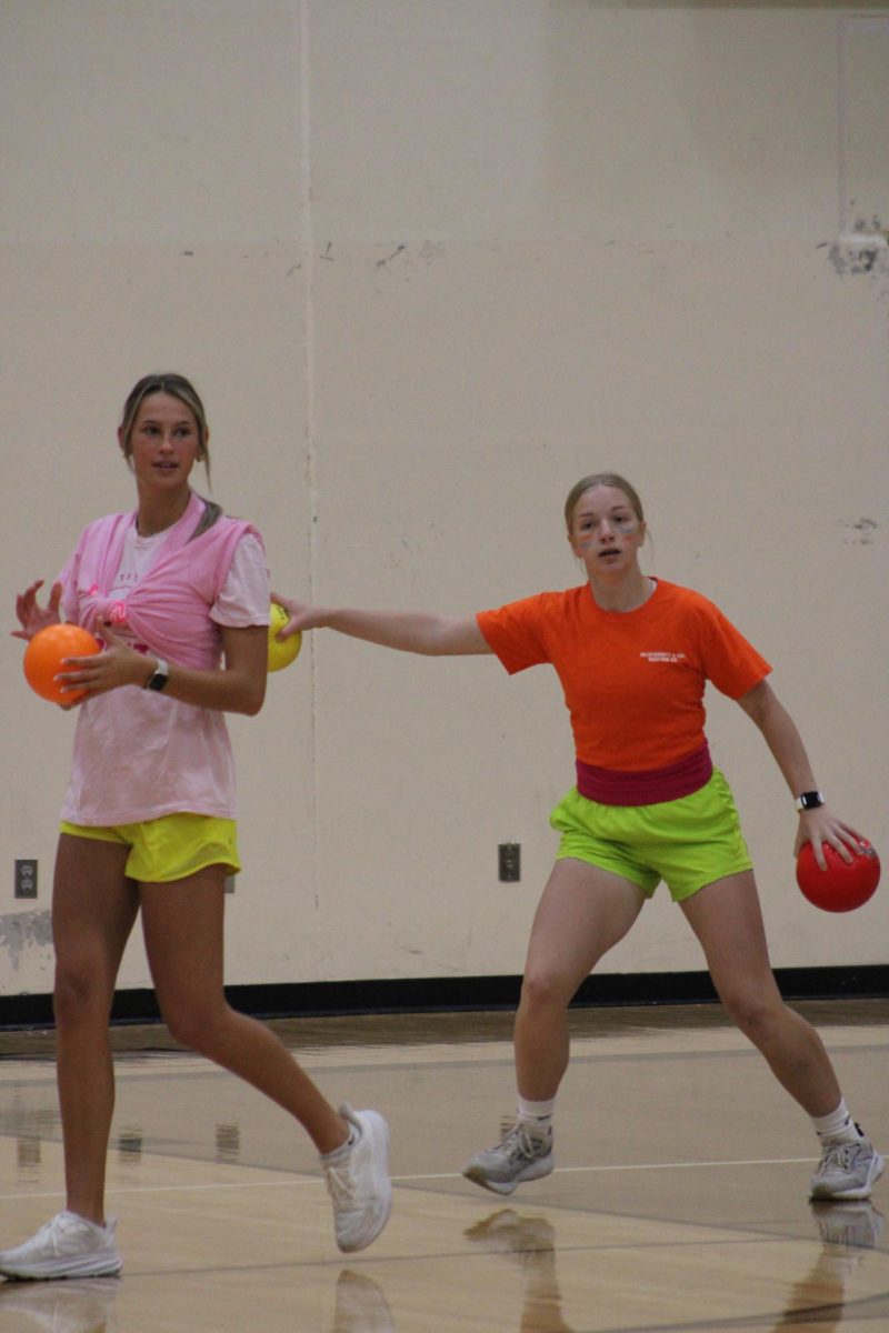 Juniors Adler Bruce and Claire Schoder face off against the sophomore girls in the dodge ball final for homecoming spirit points!