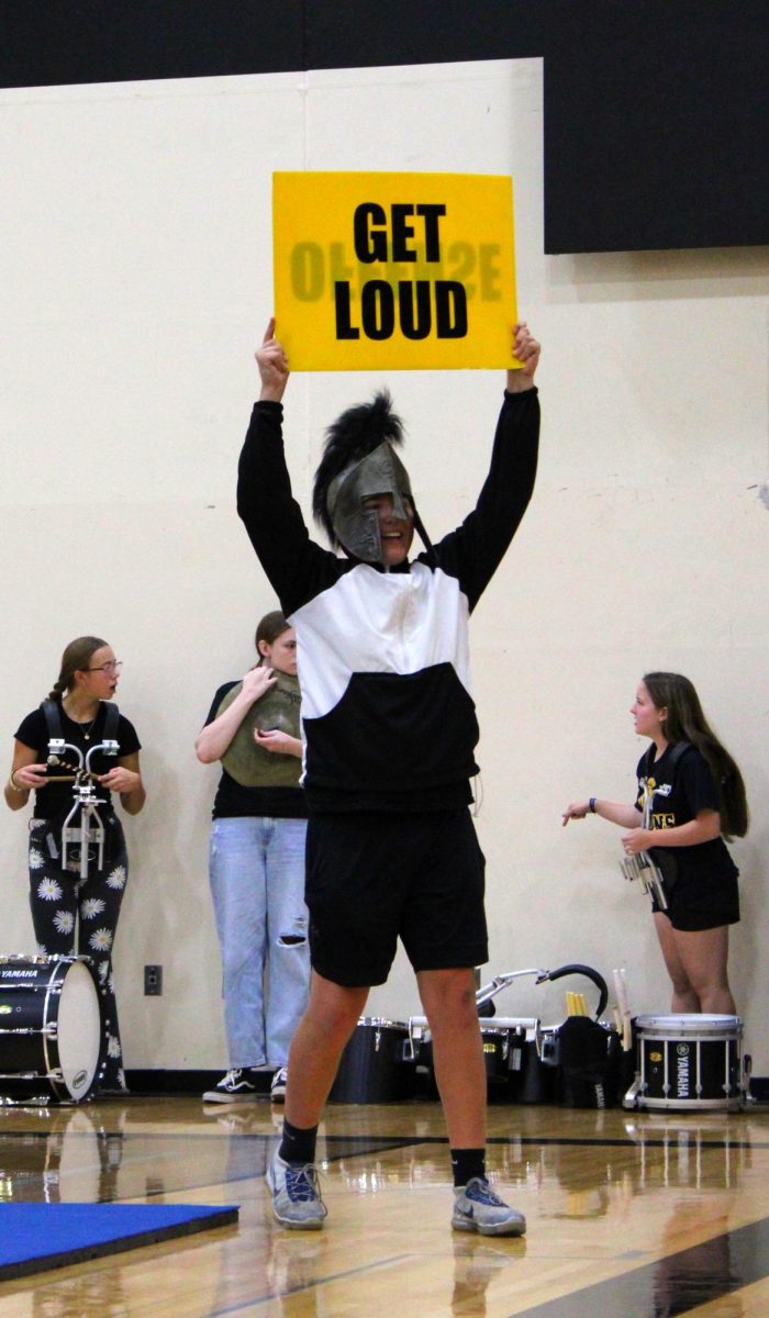 Trojan mascot Callan Kluever hypes up the AHS student section for the football game during the homecoming pep rally!