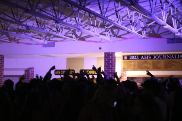 A crowd of students dance the night away at the AHS 2023 Homecoming Dance.