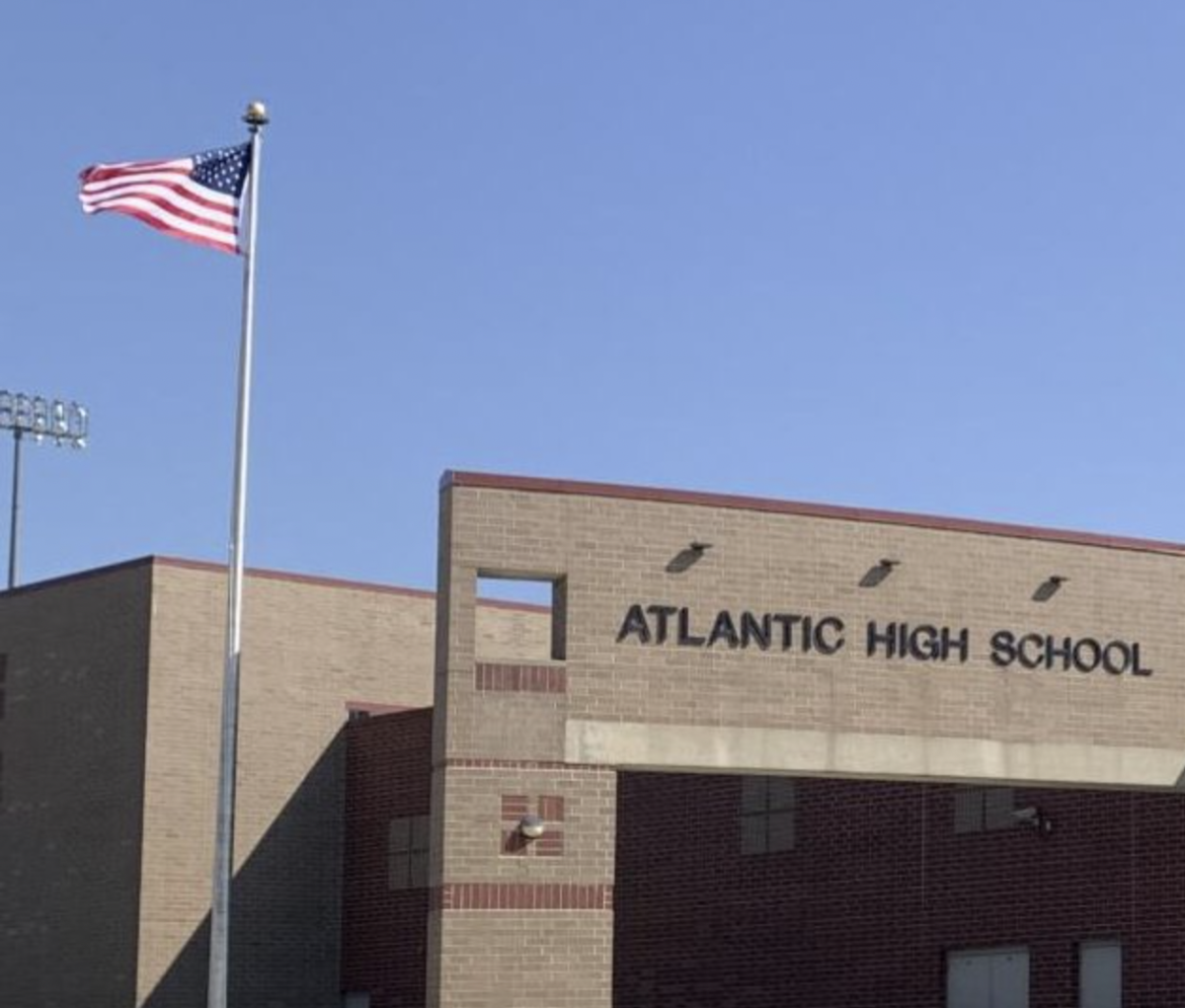 The Country's flag proudly flies before Atlantic High School earlier today. 