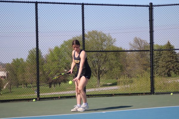 Sophomore Jacobi Harter preparing for her tie-breaking serve. 