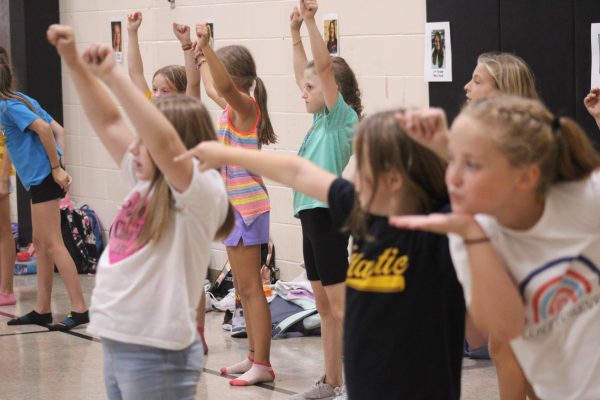 Future AHS Cheerleaders perfecting their routine, taught by current members of AHS Cheer. 