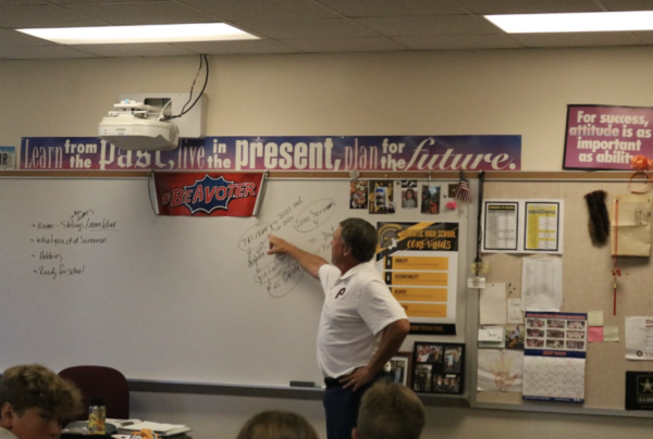 History teacher Mr. (Trace) Petersen instructing his class for their assignment in U.S History. 